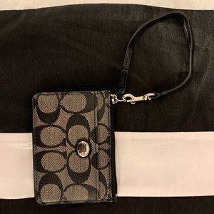 Small Coach cardholder.